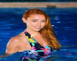 She was an athlete while growing up and was an All-Ireland champion swimmer when she was nine years old which she left when she was 13.